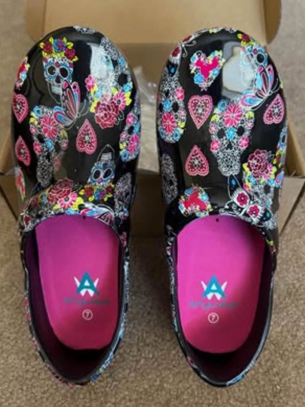 Alegria Women's Black Floral Sugar Skull Clogs - Pink Insole